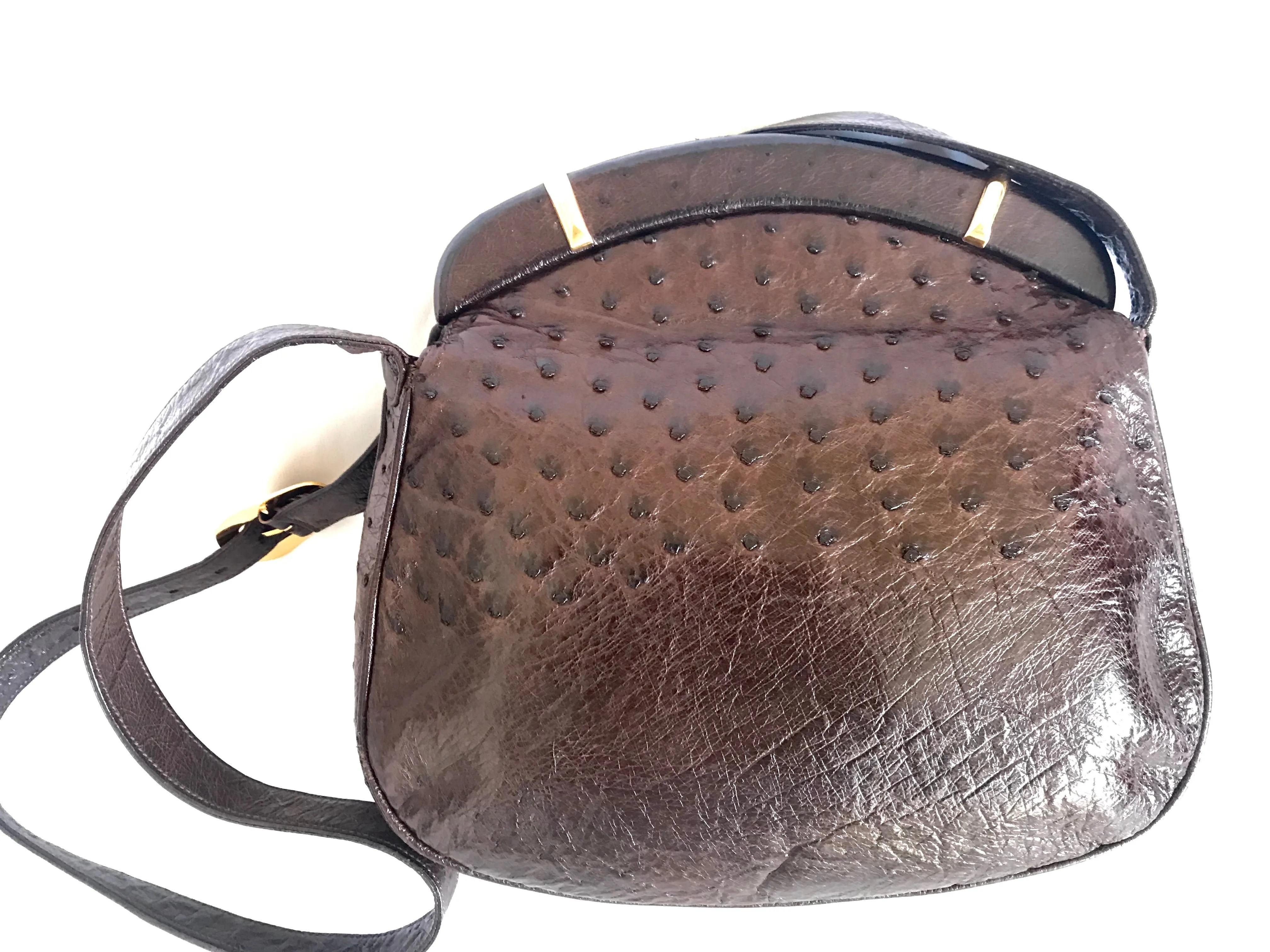 Vintage GUCCI dark brown genuine ostrich leather fisherman bag style shoulder bag with logo embossed motif. Rare masterpiece.