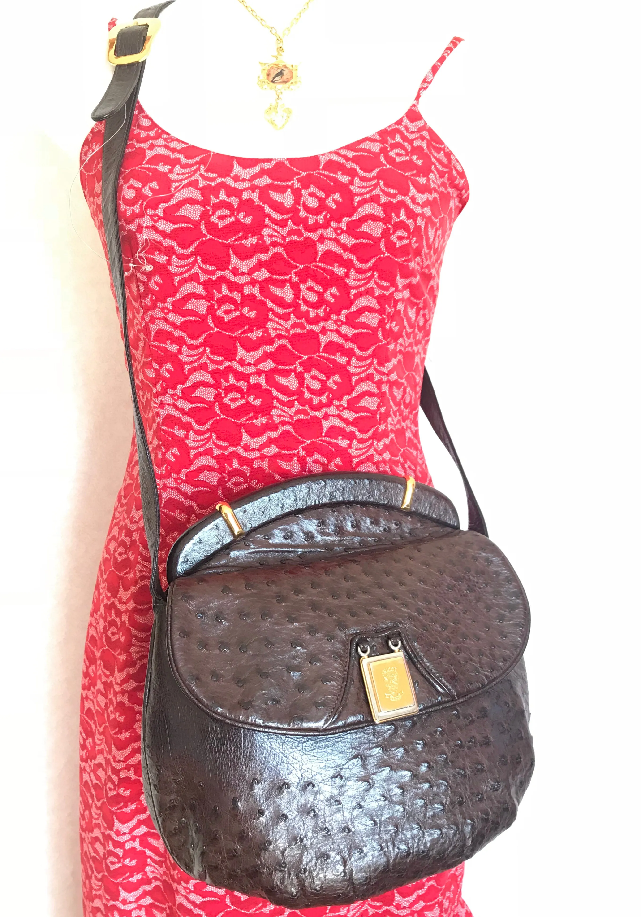 Vintage GUCCI dark brown genuine ostrich leather fisherman bag style shoulder bag with logo embossed motif. Rare masterpiece.